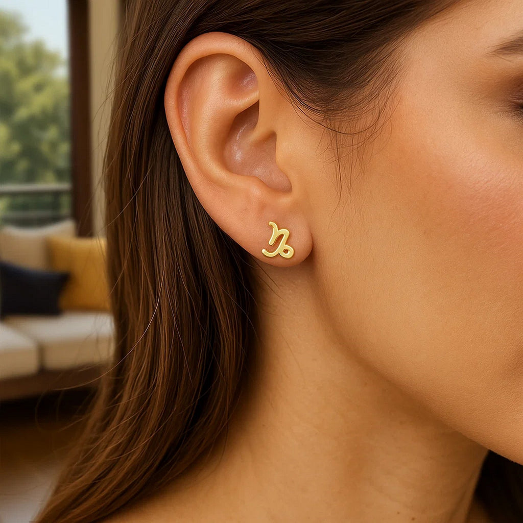14k yellow gold polished stud earrings with a sleek modern design, perfect for elegant everyday wear.