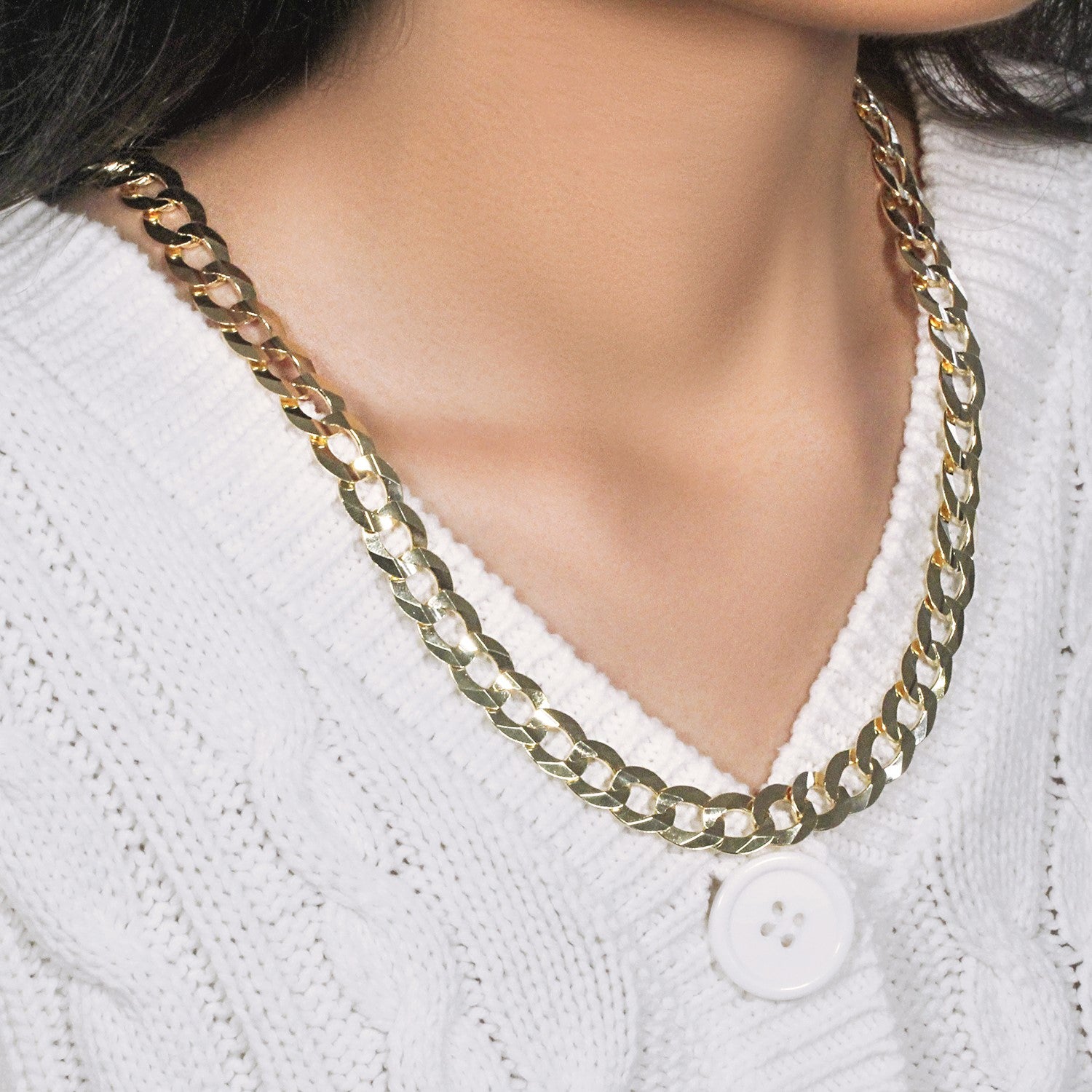 Solid curb chain in 14k yellow gold, modern design with bold links, perfect for layering or standalone elegance.