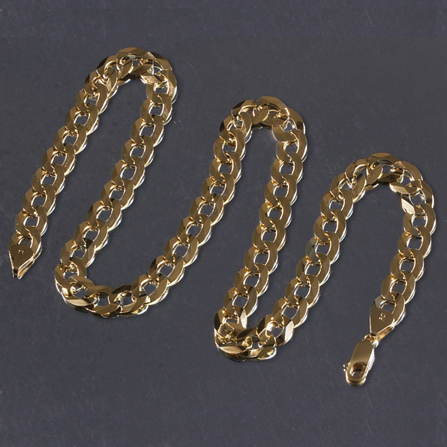 14k yellow gold solid curb chain with modern links, showcasing elegance and timeless luxury in every detail.