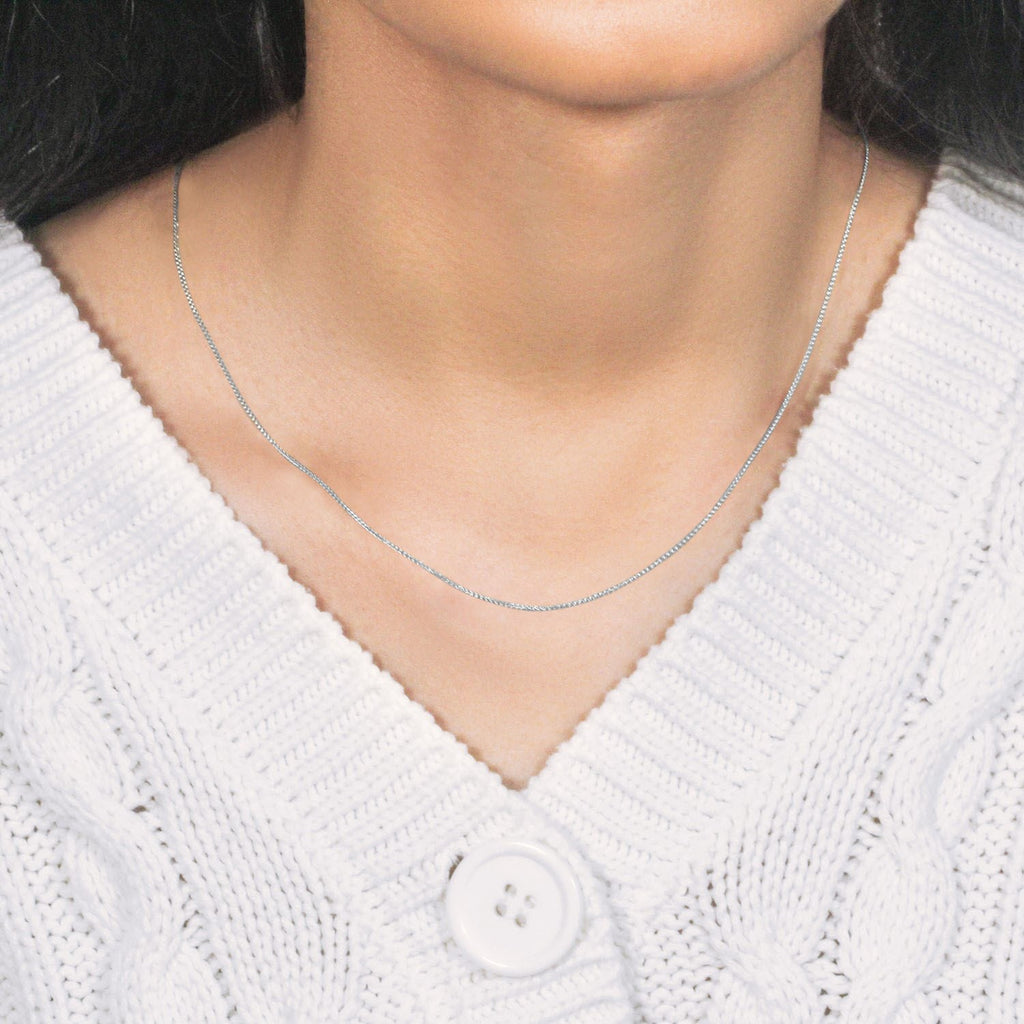 Elegant 14k white gold round wheat chain, 0.80 mm, showcasing refined craftsmanship and timeless style.