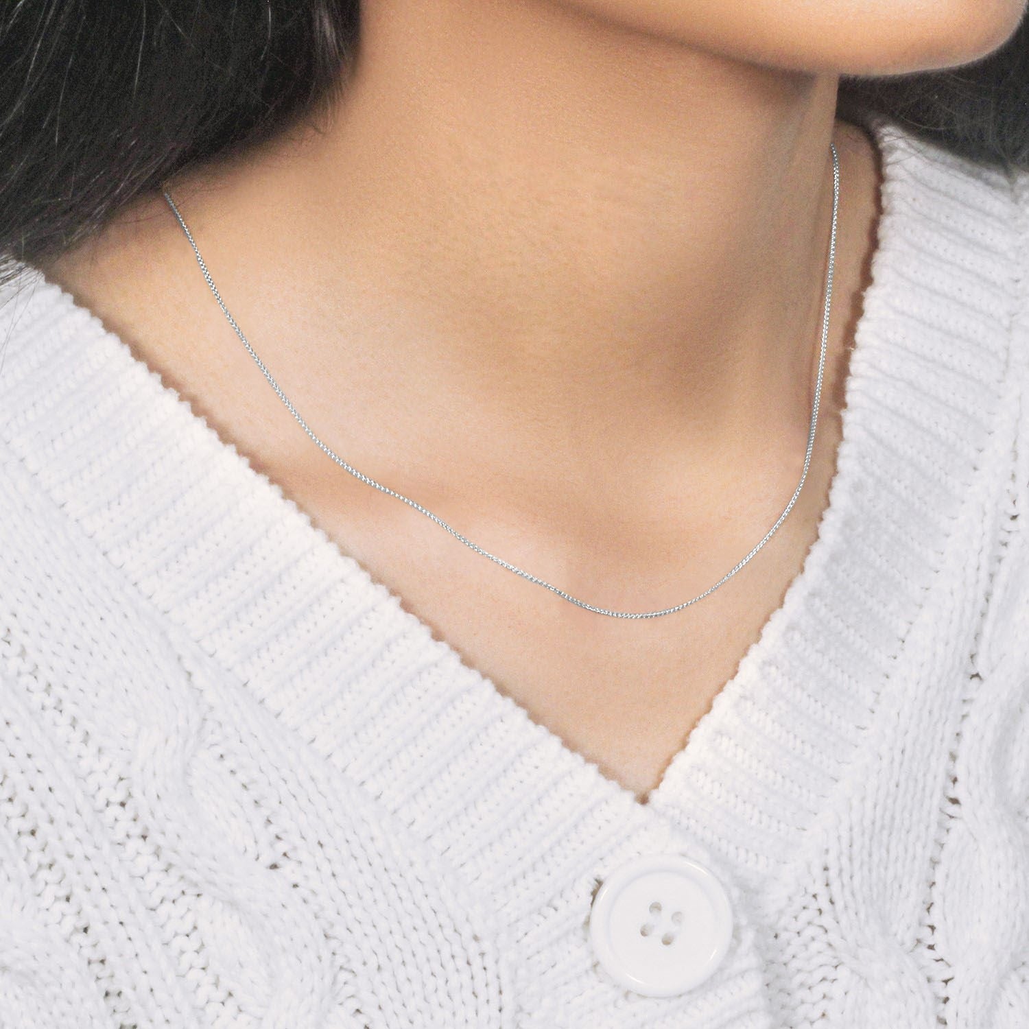 Elegant 14k white gold round wheat chain, 0.80 mm, showcasing a refined and timeless design for luxury jewelry lovers.