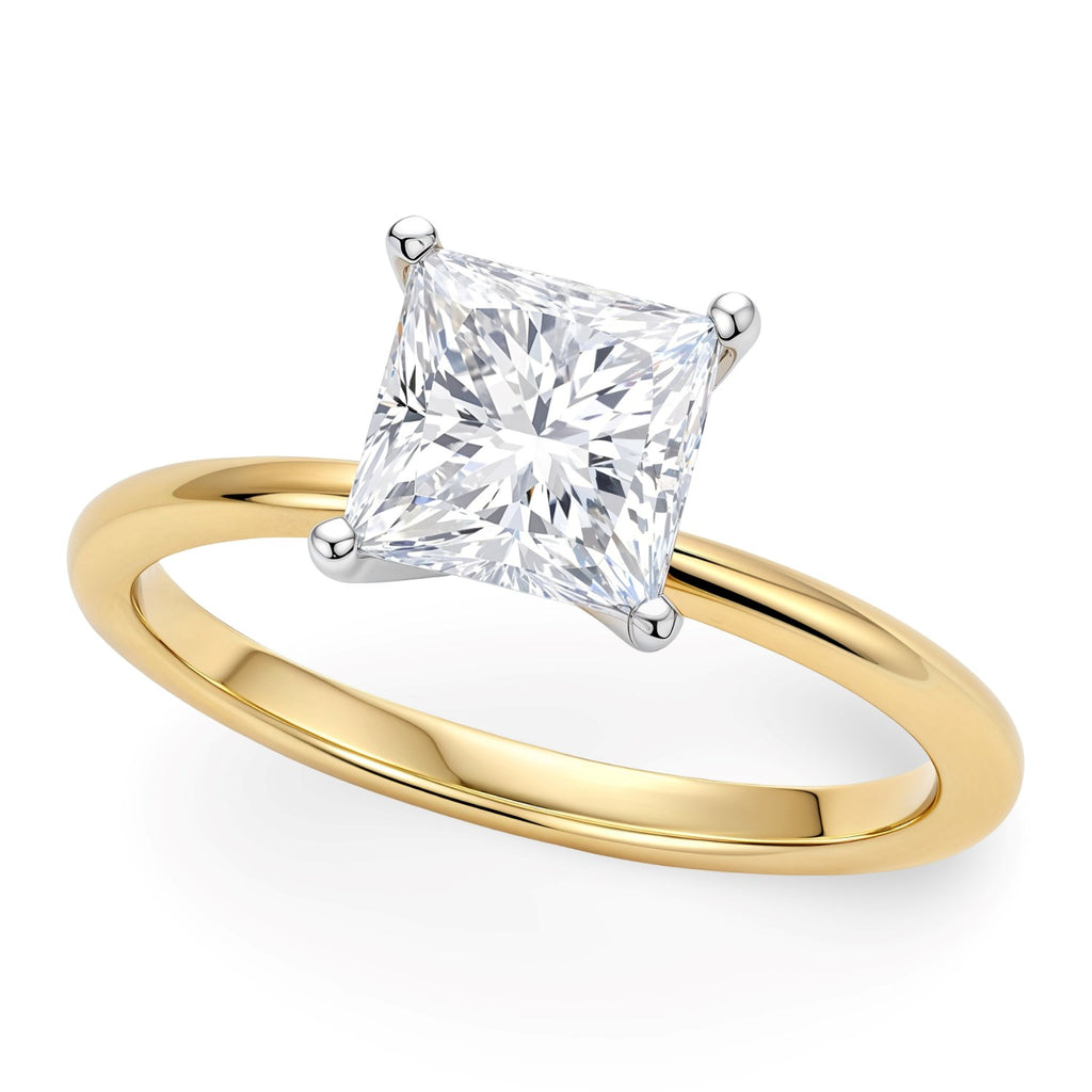 1 carat princess cut diamond solitaire ring in 14k yellow gold, showcasing elegant simplicity and timeless luxury.