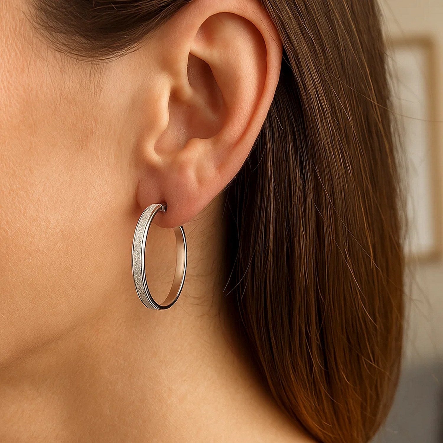 14k white gold modern hoop earrings featuring a stunning glitter design and elegant round shape.