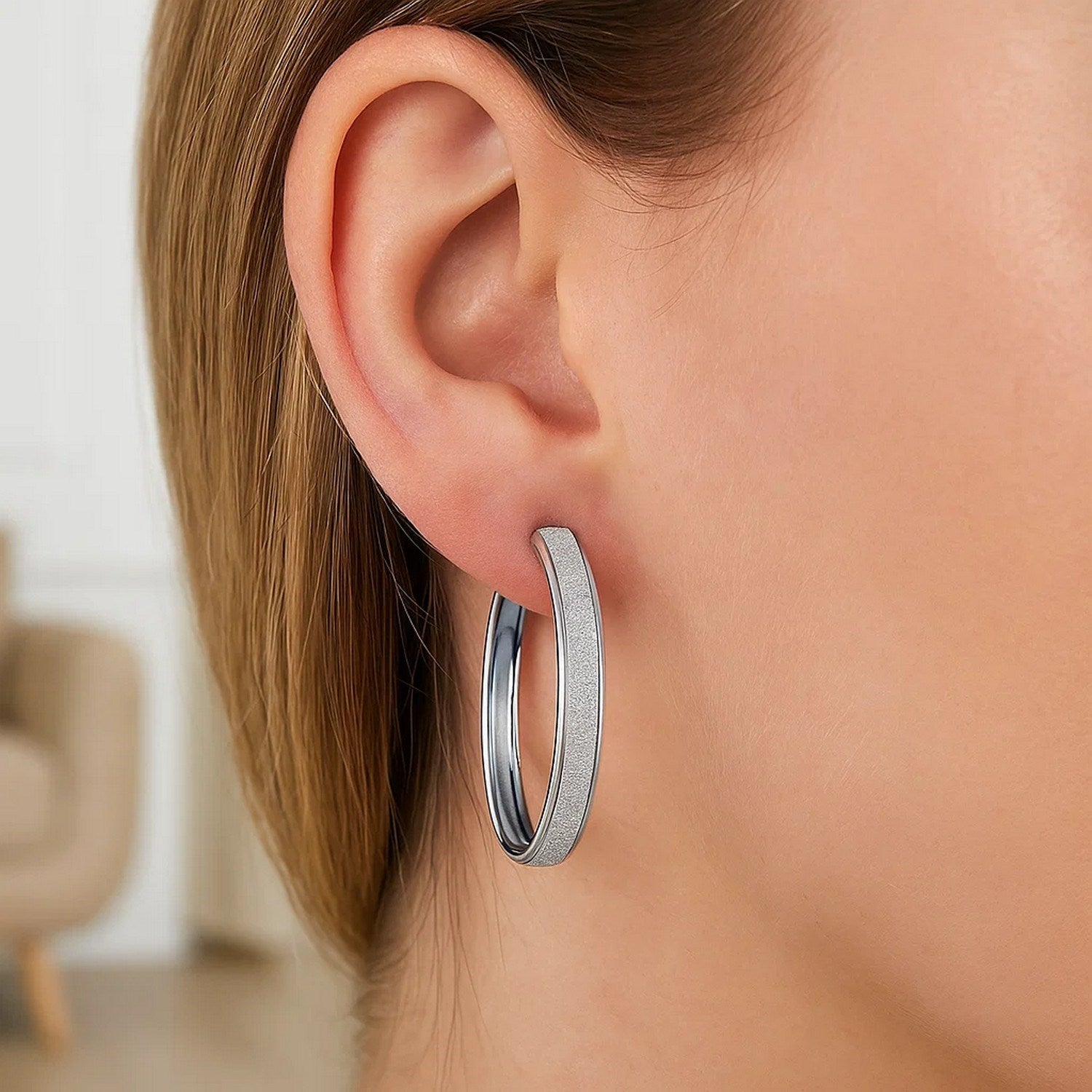 14k white gold modern hoop earrings featuring a stunning glitter design and elegant round silhouette.