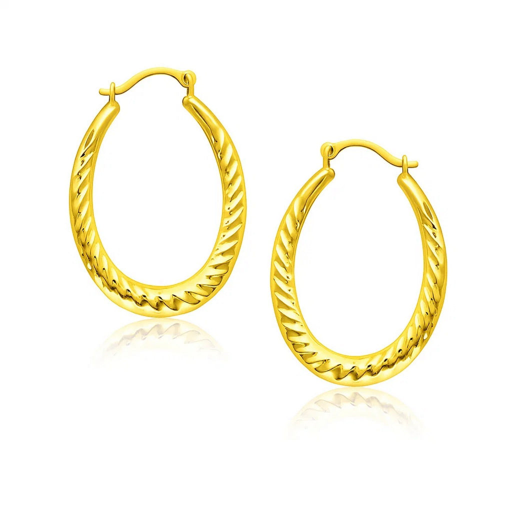 14k yellow gold textured hoop earrings, elegantly designed for a luxurious statement in any jewelry collection.