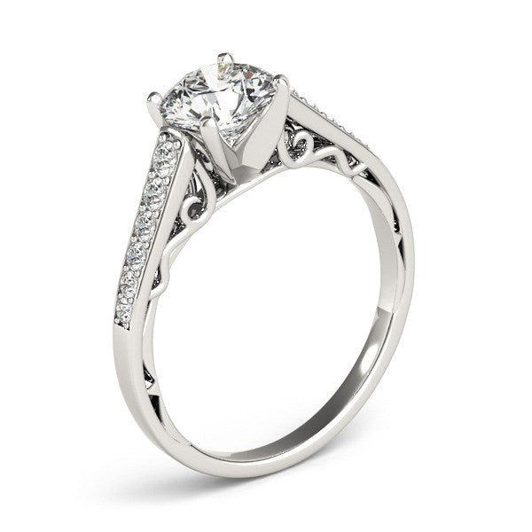 Elegant 14k white gold cathedral design engagement ring featuring 1 1/4 cttw of sparkling diamonds.