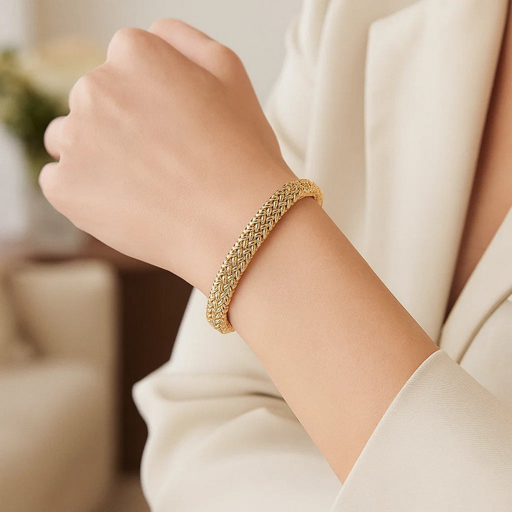 14k yellow gold high polish thick braided bracelet with elegant chain design, showcasing luxurious craftsmanship.