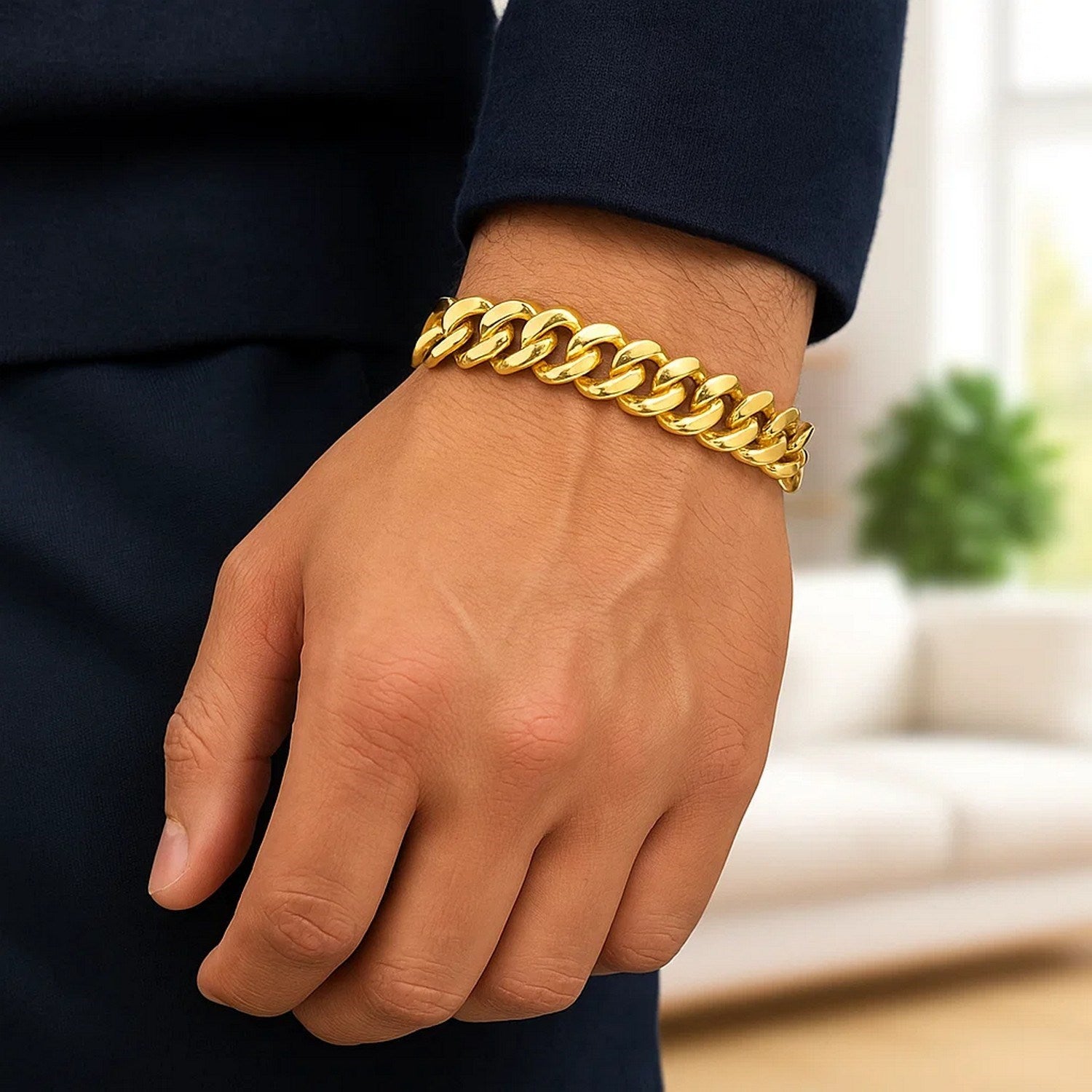 14k yellow gold polished curb chain bracelet with modern link design, showcasing luxurious elegance and craftsmanship.