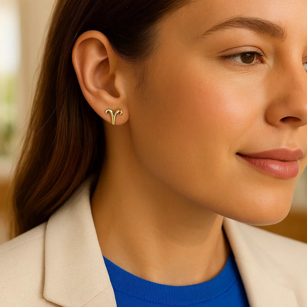 Elegant 14k yellow gold stud earrings featuring a refined design, perfect for sophisticated occasions.