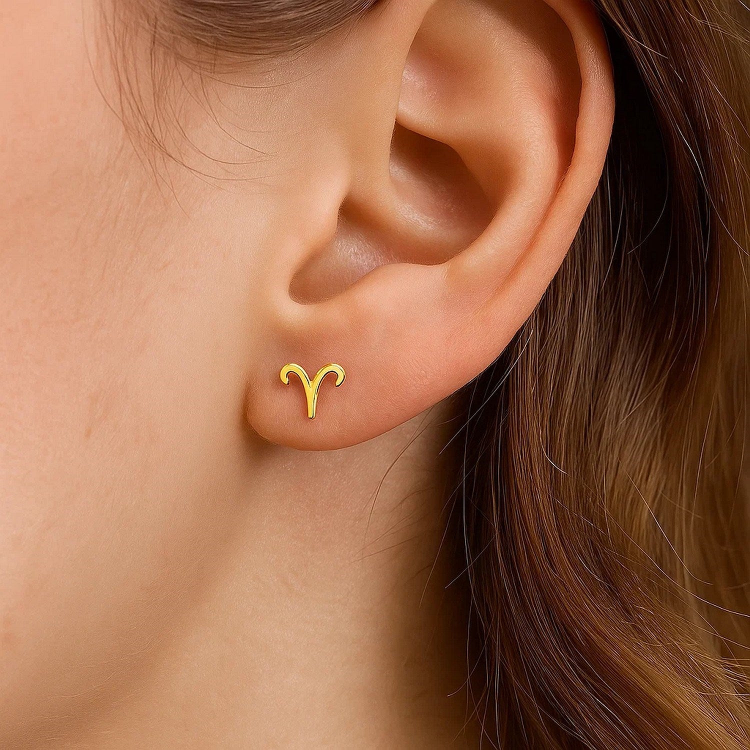 Elegant 14k yellow gold stud earrings featuring a refined minimalist design, perfect for sophisticated occasions.