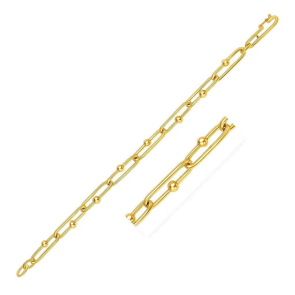14k yellow gold beaded oval chain bracelet, modern design, 7 3/4 inch length, luxurious and elegant accessory.