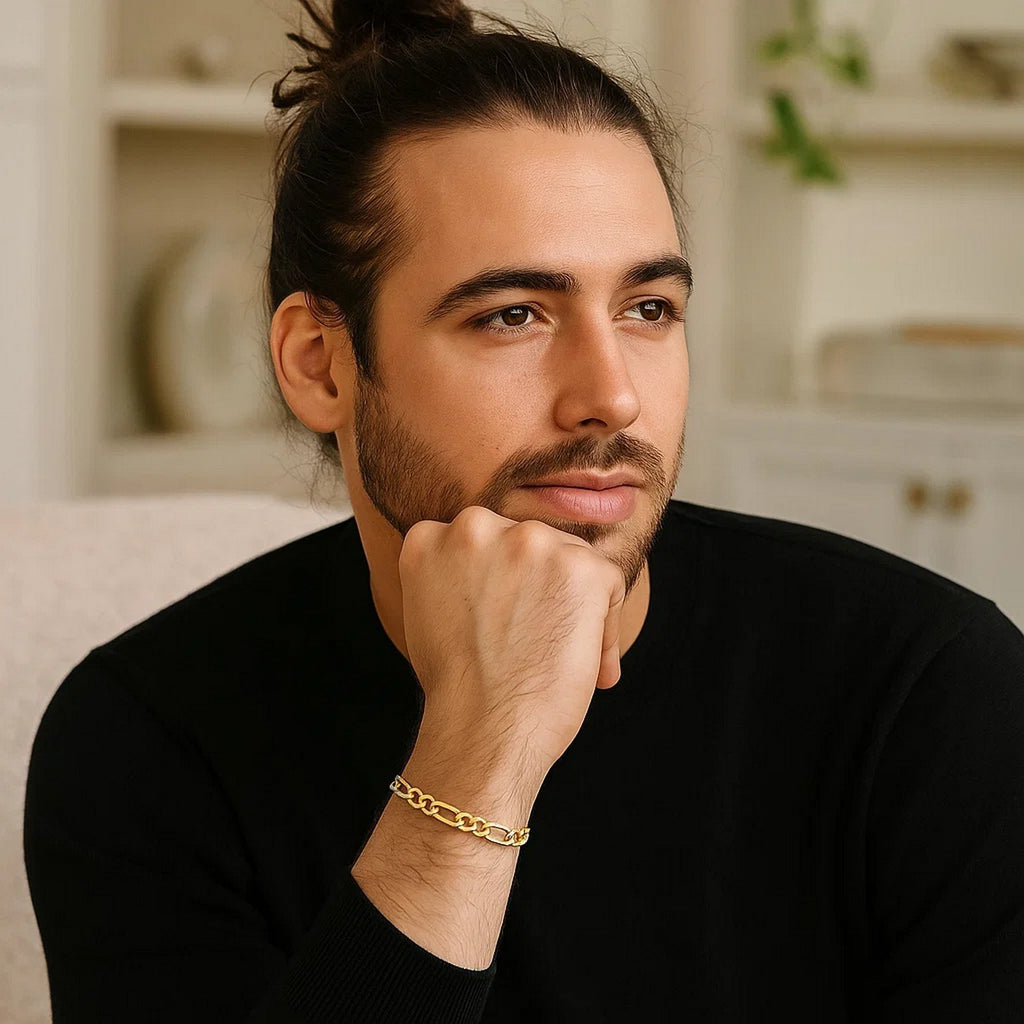 14k yellow gold Lite Figaro bracelet featuring modern chain links, showcasing elegance and timeless style.