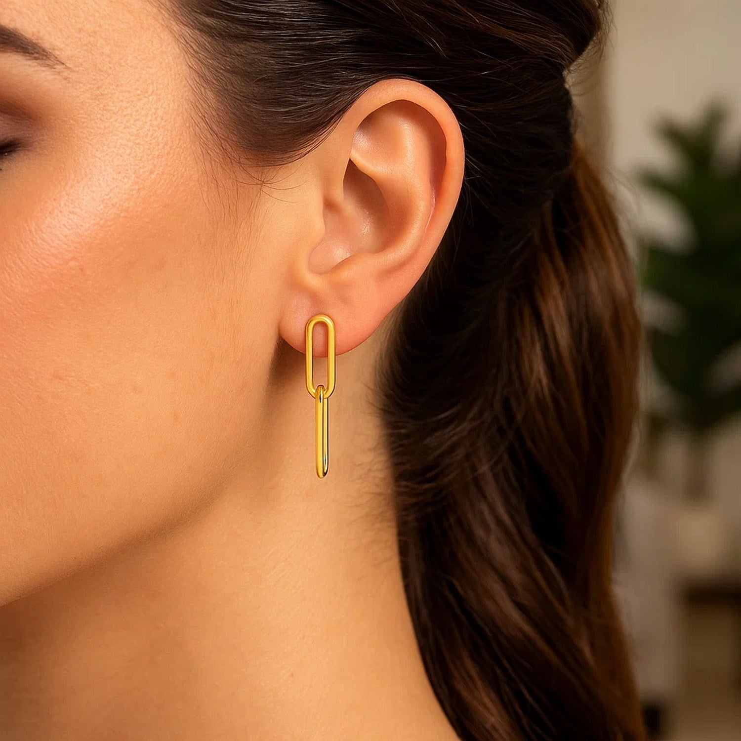 14k yellow gold chain link dangle earrings with modern design, showcasing elegance and timeless sophistication.
