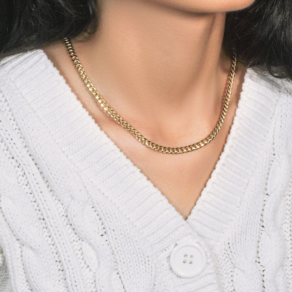 Elegant 10k yellow gold Miami Cuban semi-solid chain, 4.50 mm links, showcasing luxurious craftsmanship and style.