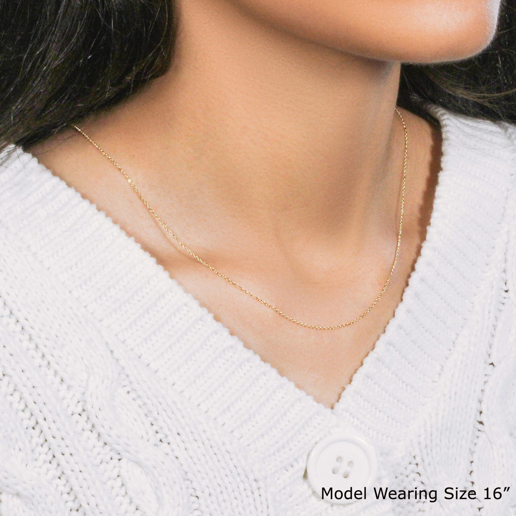 10k yellow gold diamond cut cable link chain, elegant design with shimmering links, perfect for layering or standalone wear.