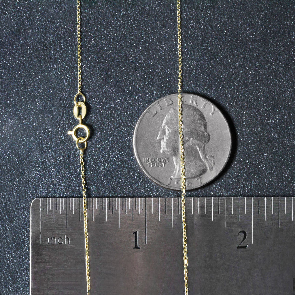 10k yellow gold diamond cut cable link chain, elegantly designed with delicate links, perfect for layering or solo wear.