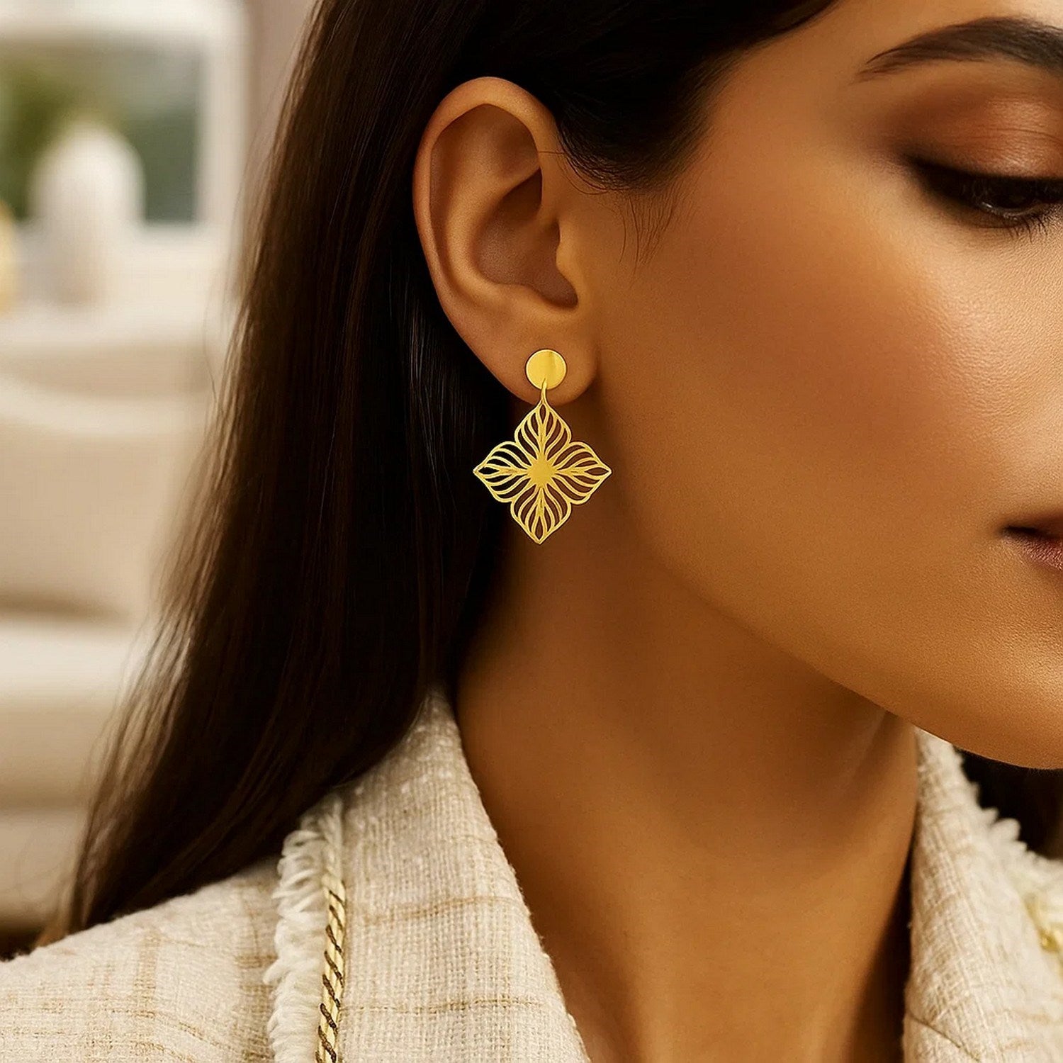 14k yellow gold high polish floral cutout dangle earrings, elegantly designed for a luxurious touch.