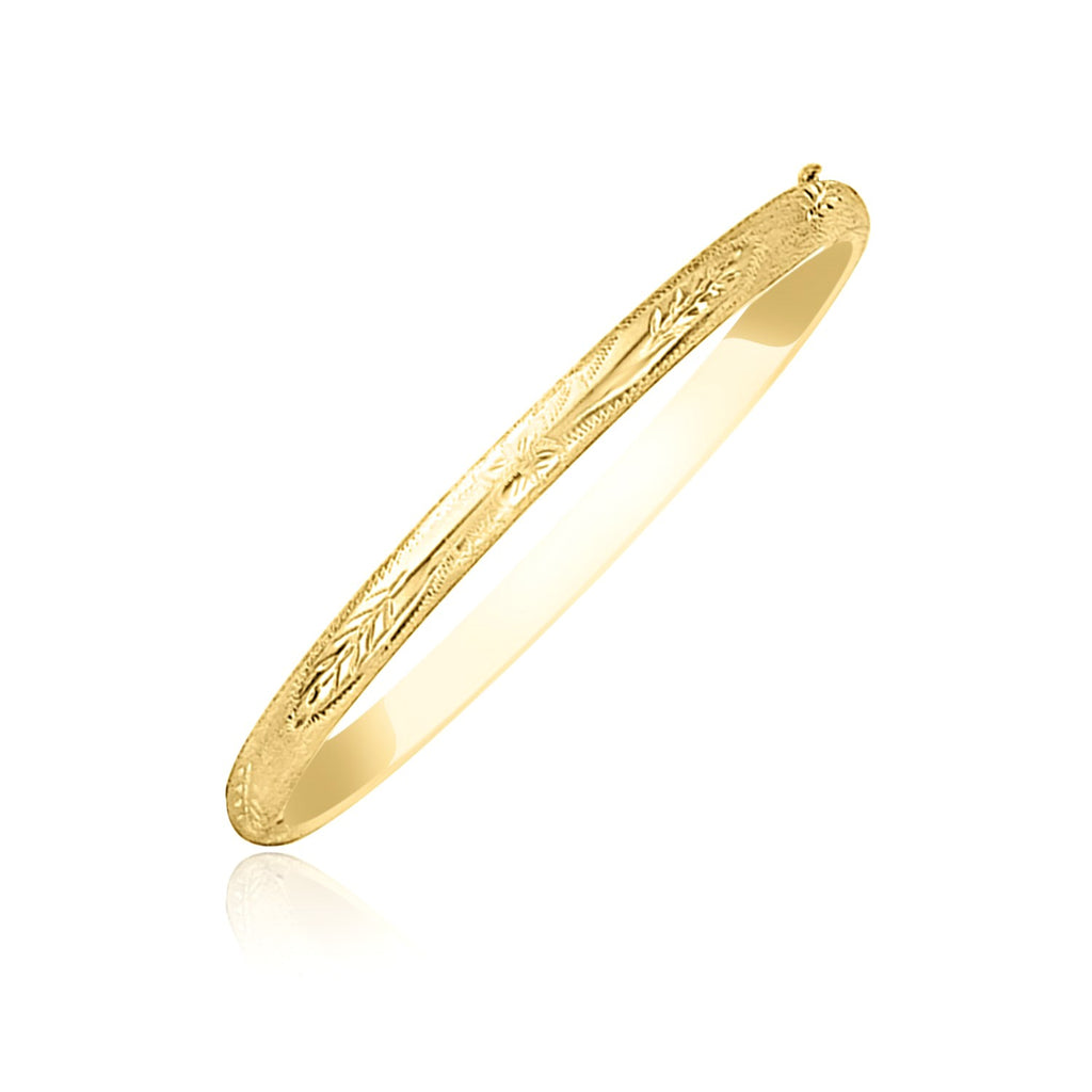 10k yellow gold Florentine bangle featuring a botanical pattern and luxurious diamond accents, perfect for modern elegance.