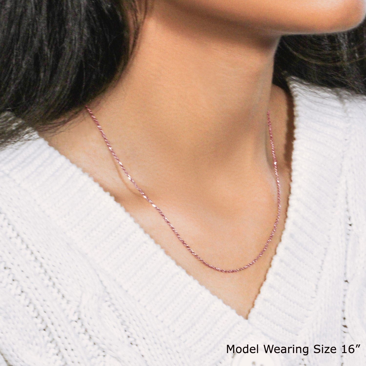 Elegant 18k rose gold diamond cut cable link chain, featuring refined links and a luxurious shine.