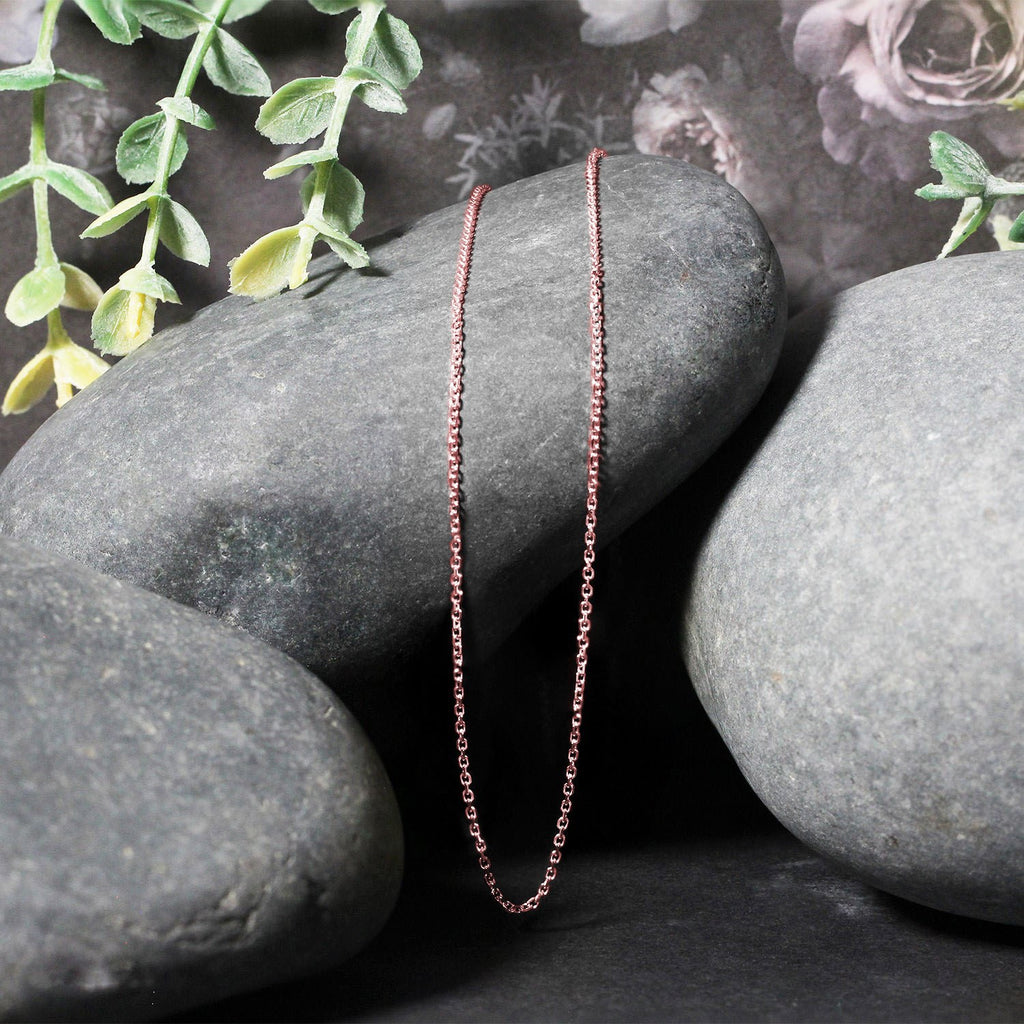 Elegant 18k rose gold diamond cut cable link chain showcasing exquisite craftsmanship and luxurious design.
