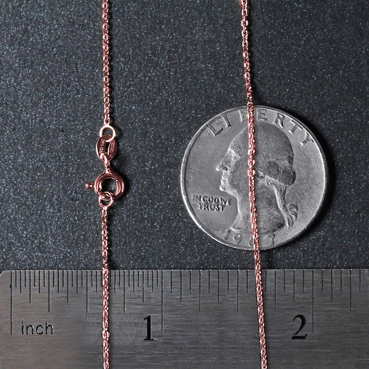 Elegant 18k rose gold diamond cut cable link chain, featuring refined links and a luxurious shine.