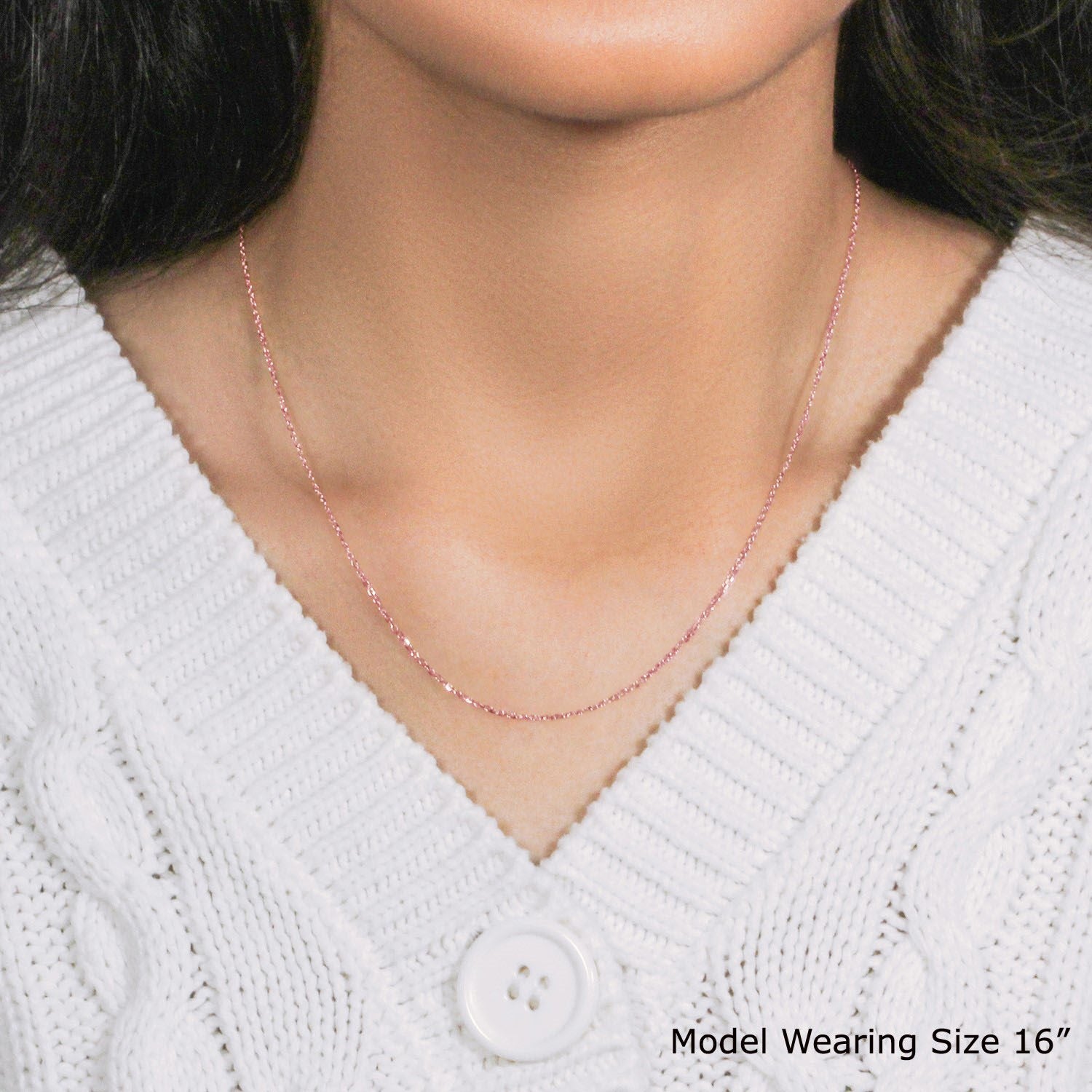 Elegant 18k rose gold diamond cut cable link chain, featuring refined links and a luxurious finish.