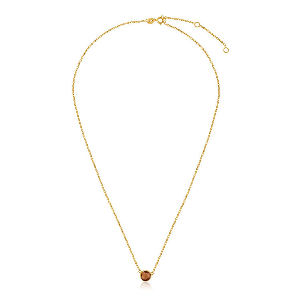 14k yellow gold 17-inch necklace featuring an elegant round citrine on a delicate chain.