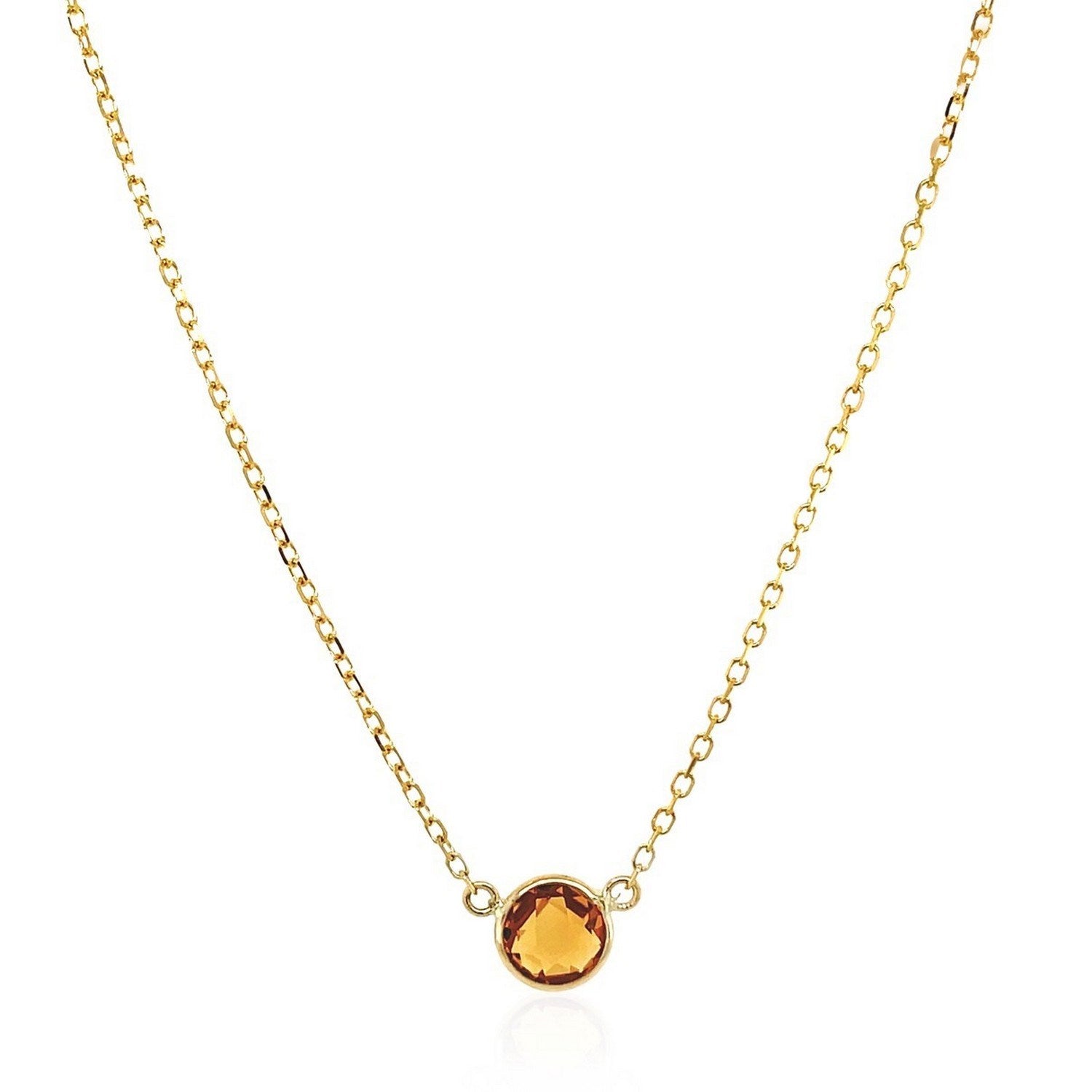 Elegant 14k yellow gold necklace featuring a round citrine on a delicate chain, perfect for sophisticated style.