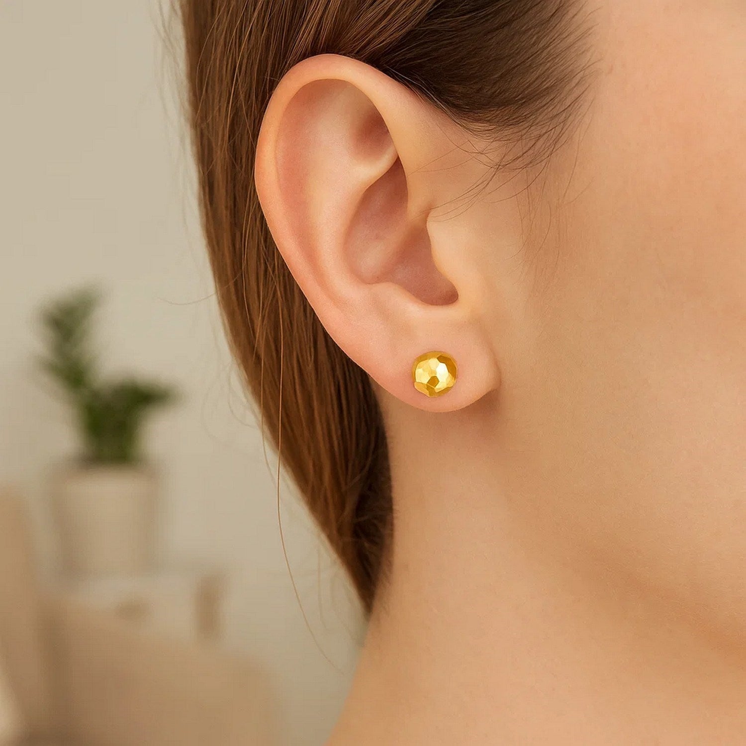14k yellow gold minimalist faceted ball stud earrings showcasing refined elegance and timeless design.