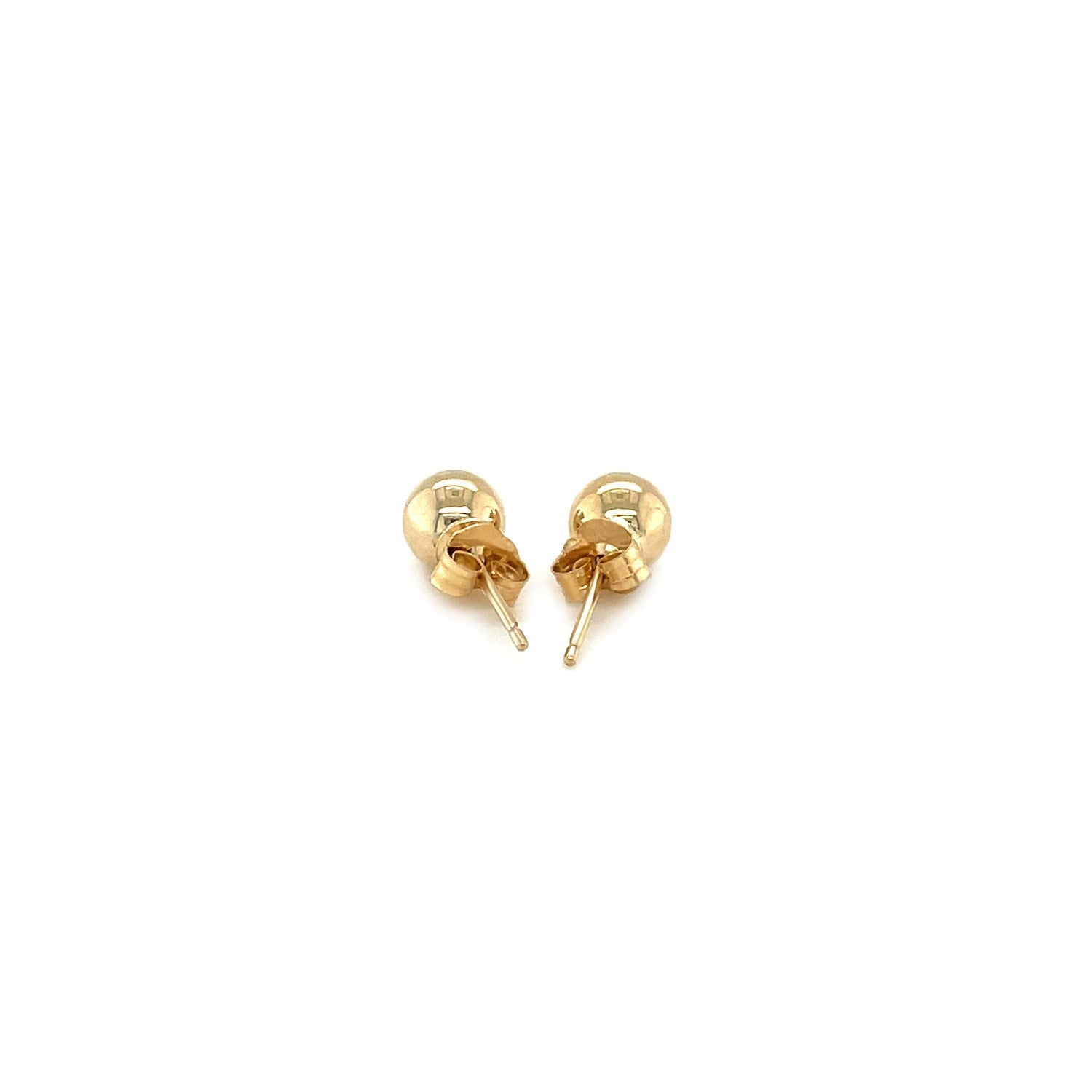 14k yellow gold classic round stud earrings, 5mm, showcasing timeless elegance and refined craftsmanship.