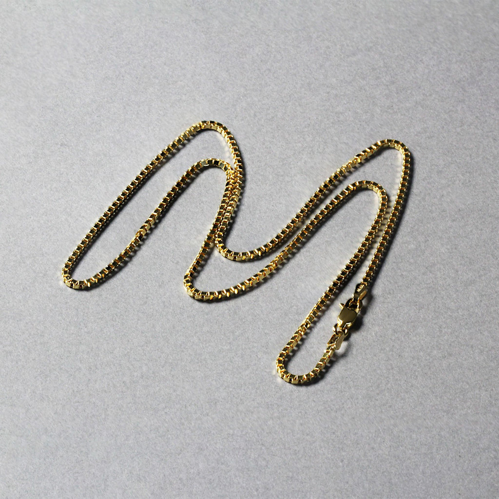 14k yellow gold classic box chain, modern design, 1.40 mm width, perfect for layering or as a standalone piece.