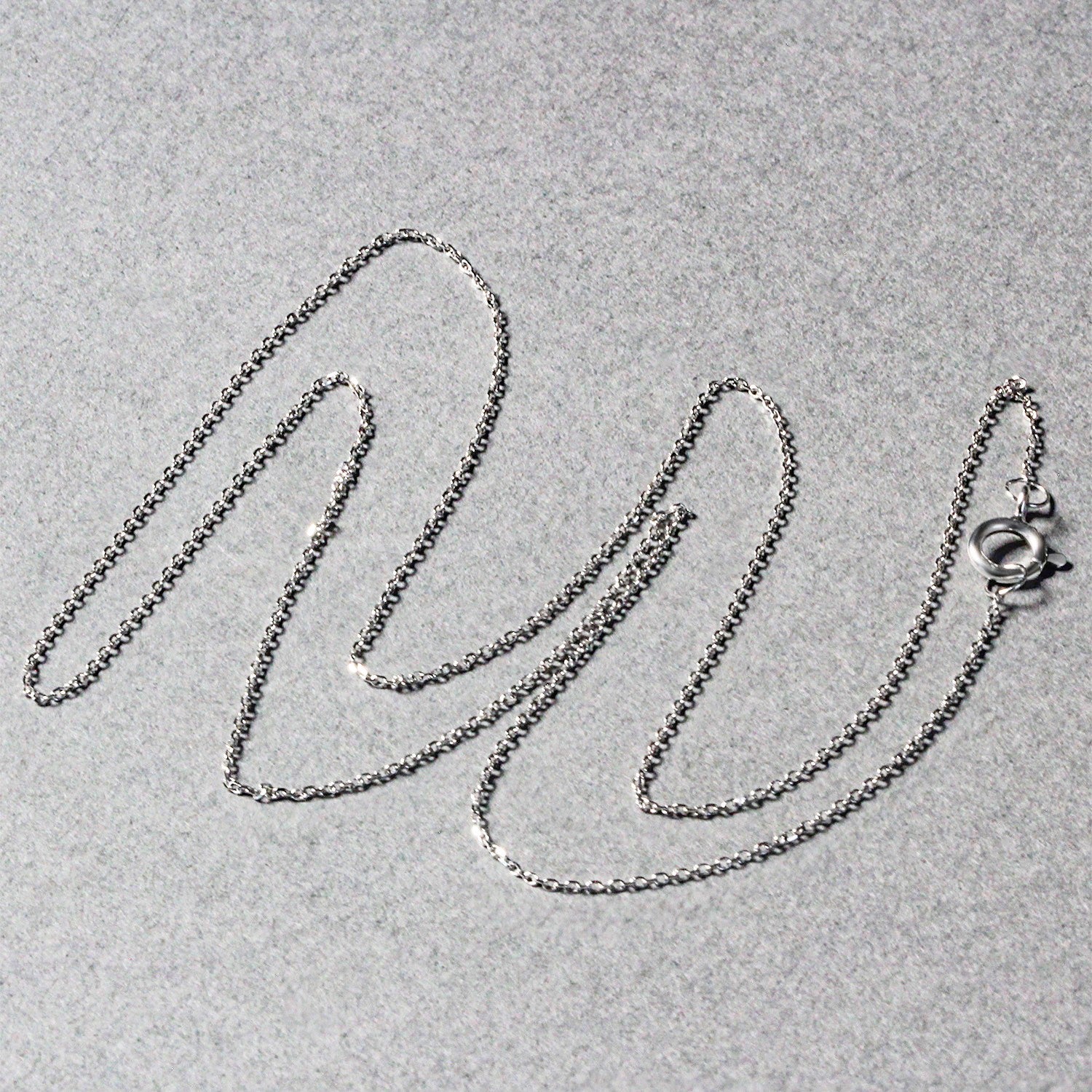 14k white gold diamond cut cable link chain with modern design, showcasing exquisite craftsmanship and elegance.