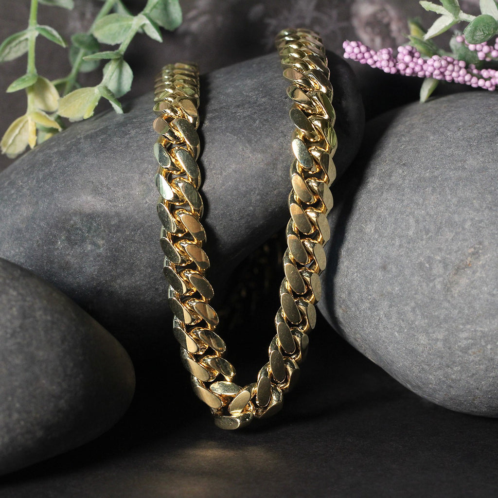 14k yellow gold classic Miami Cuban chain, 9.20 mm, featuring a timeless round design for elegant layering.