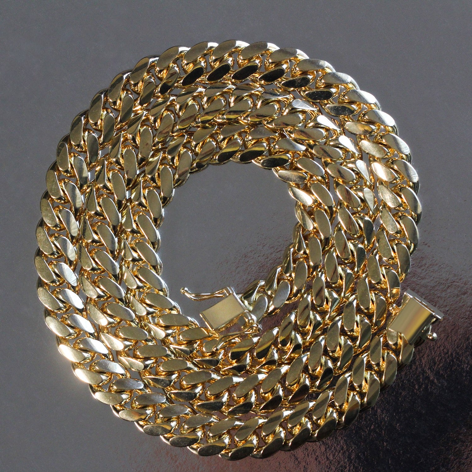 14k yellow gold classic Miami Cuban solid chain, 9.20 mm, featuring a timeless round link design for luxury elegance.
