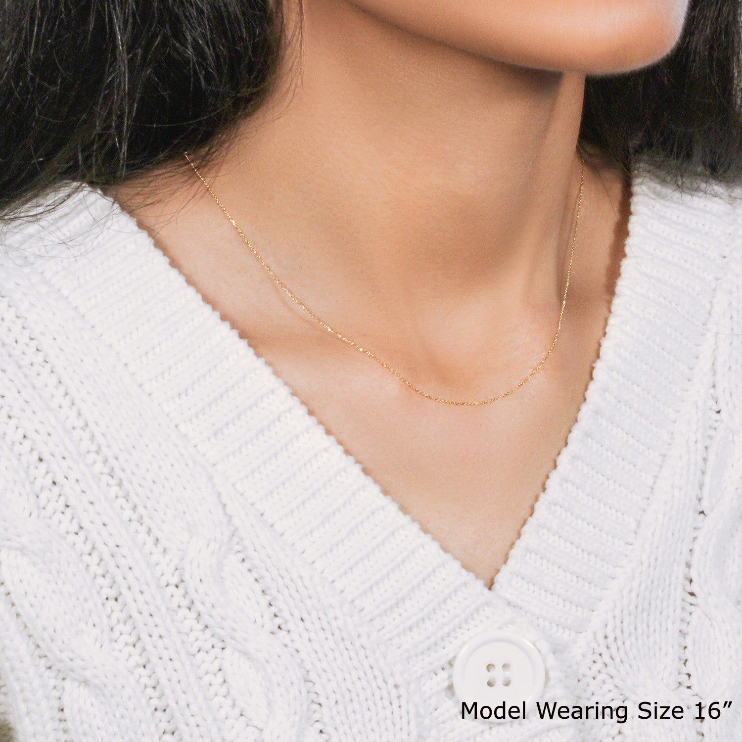 14k yellow gold diamond cut cable link chain with modern design, featuring delicate round links for a luxurious look.