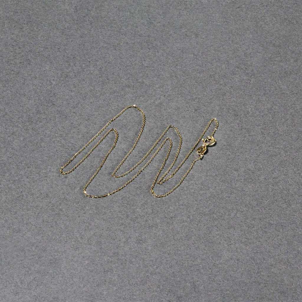 14k yellow gold diamond cut cable link chain, modern design with elegant round links, perfect for layering or solo wear.