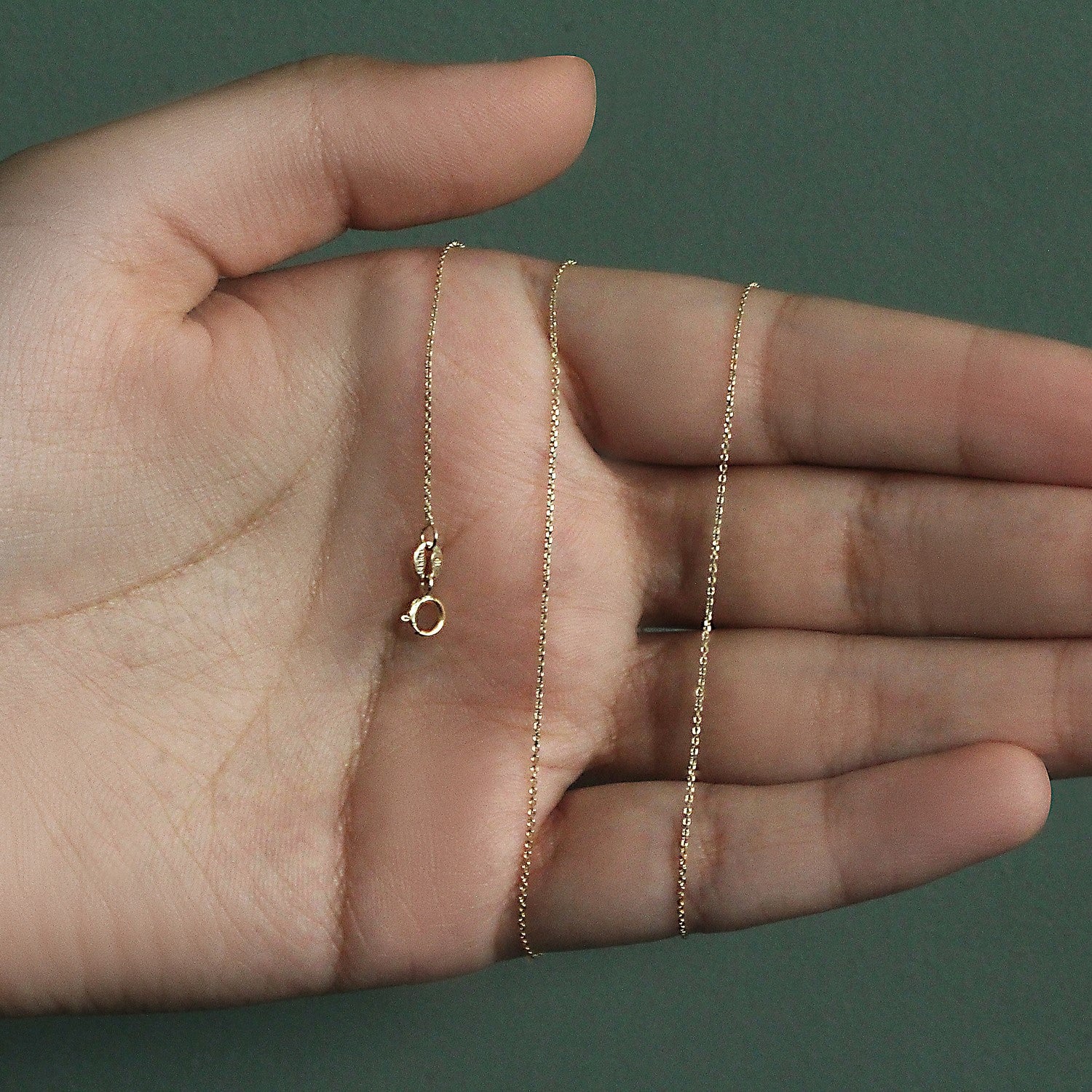 14k yellow gold diamond cut cable link chain, modern design with elegant round links, perfect for layering or solo wear.