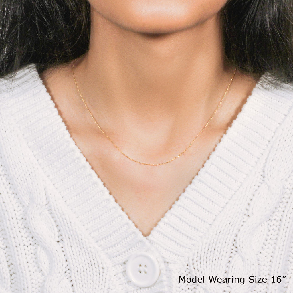 14k yellow gold diamond cut cable link chain, modern design with elegant round links, perfect for layering or solo wear.
