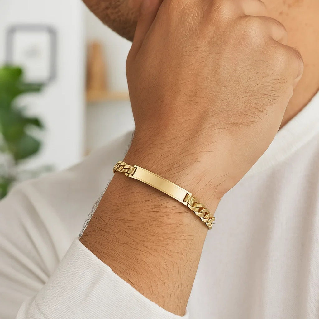 14k yellow gold curb ID bracelet featuring a modern chain design, perfect for luxury jewelry enthusiasts.