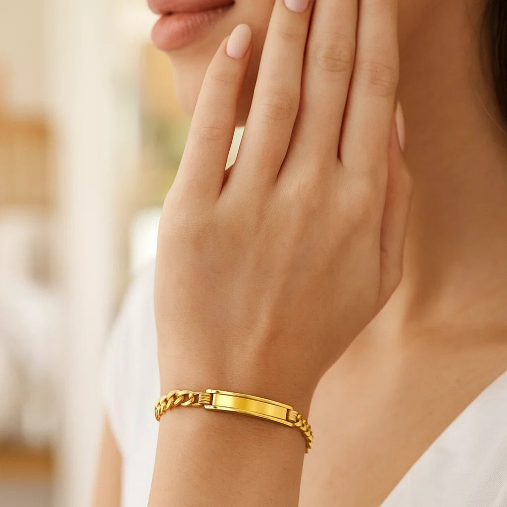 14k yellow gold curb ID bracelet featuring a modern chain design, perfect for elegant everyday wear.
