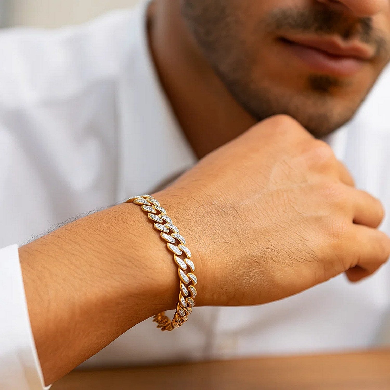 14k two-tone gold curb chain bracelet featuring diamond pave links in a classic design, perfect for luxury elegance.