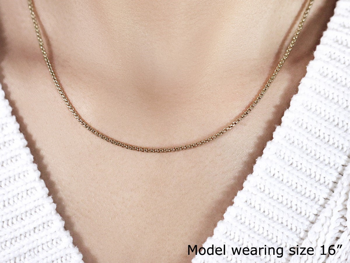 14k yellow gold solid round box chain, modern design, 1.6 mm width, perfect for layering or as a statement piece.