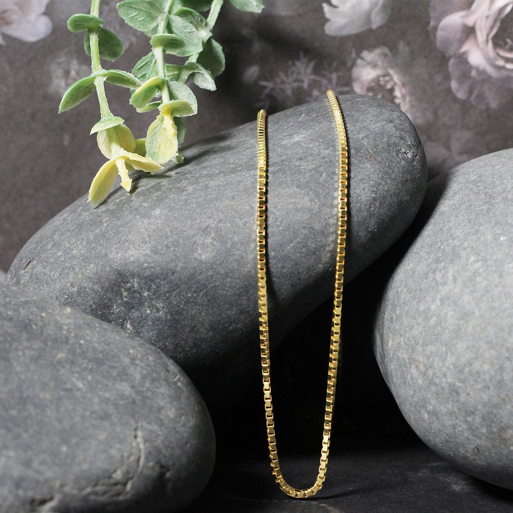 14k yellow gold classic box chain, 1.7 mm width, showcasing timeless elegance and luxurious craftsmanship.