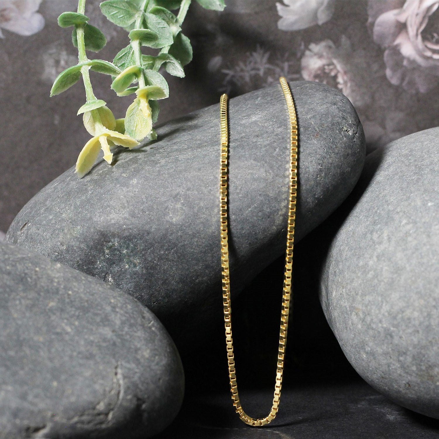 14k yellow gold classic box chain, 1.7 mm, showcasing timeless elegance and luxurious craftsmanship.