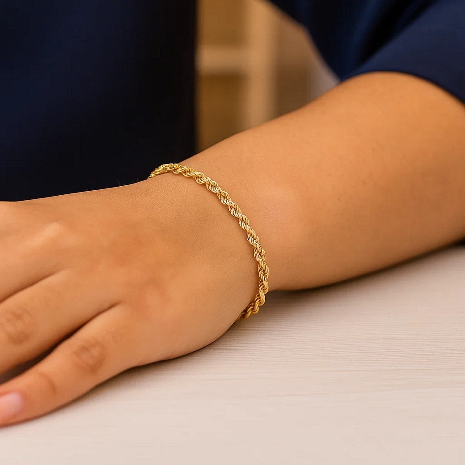 Contemporary 10k yellow gold Lite Rope Chain bracelet, 2.50 mm, showcasing luxurious craftsmanship and elegant design.