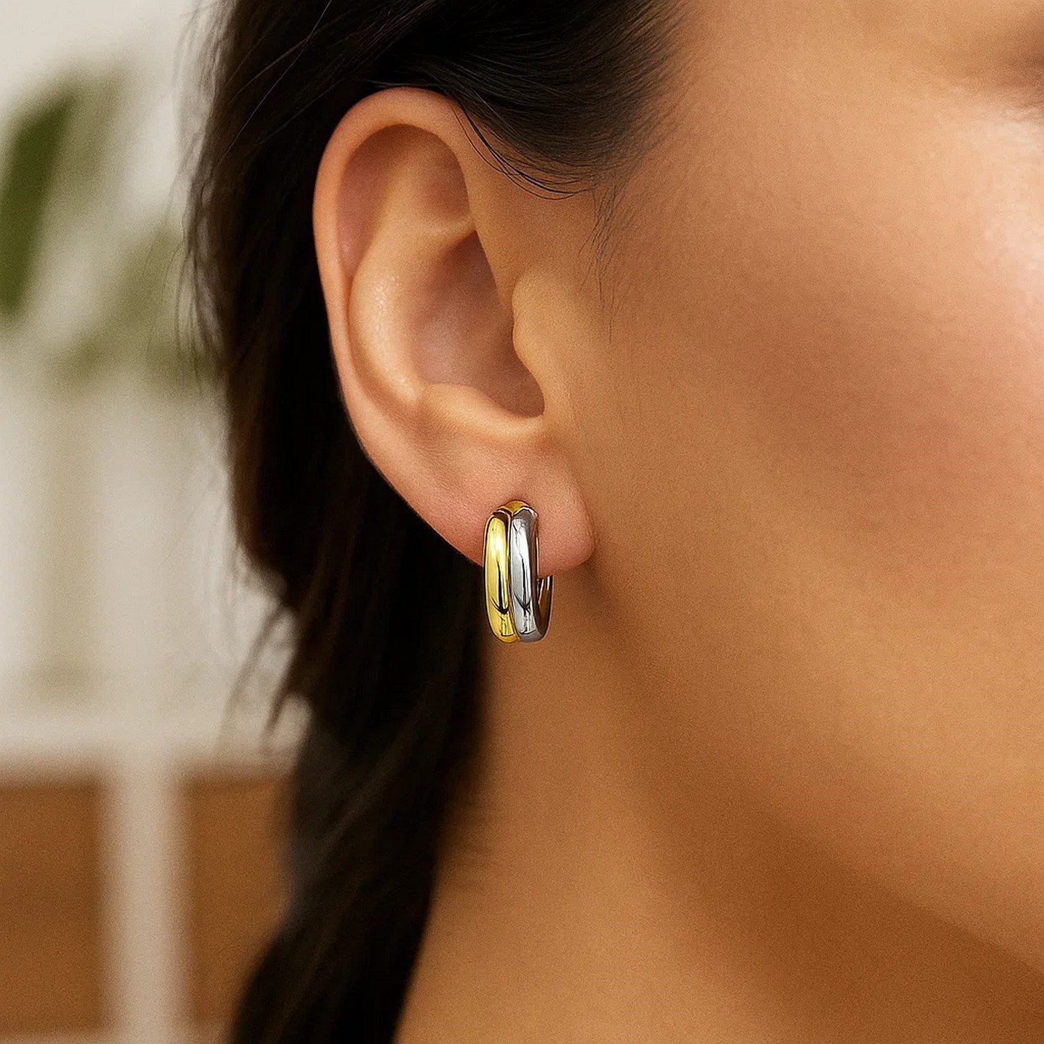 14k two-tone gold textured double hoop earrings with a modern design, perfect for elegant occasions.