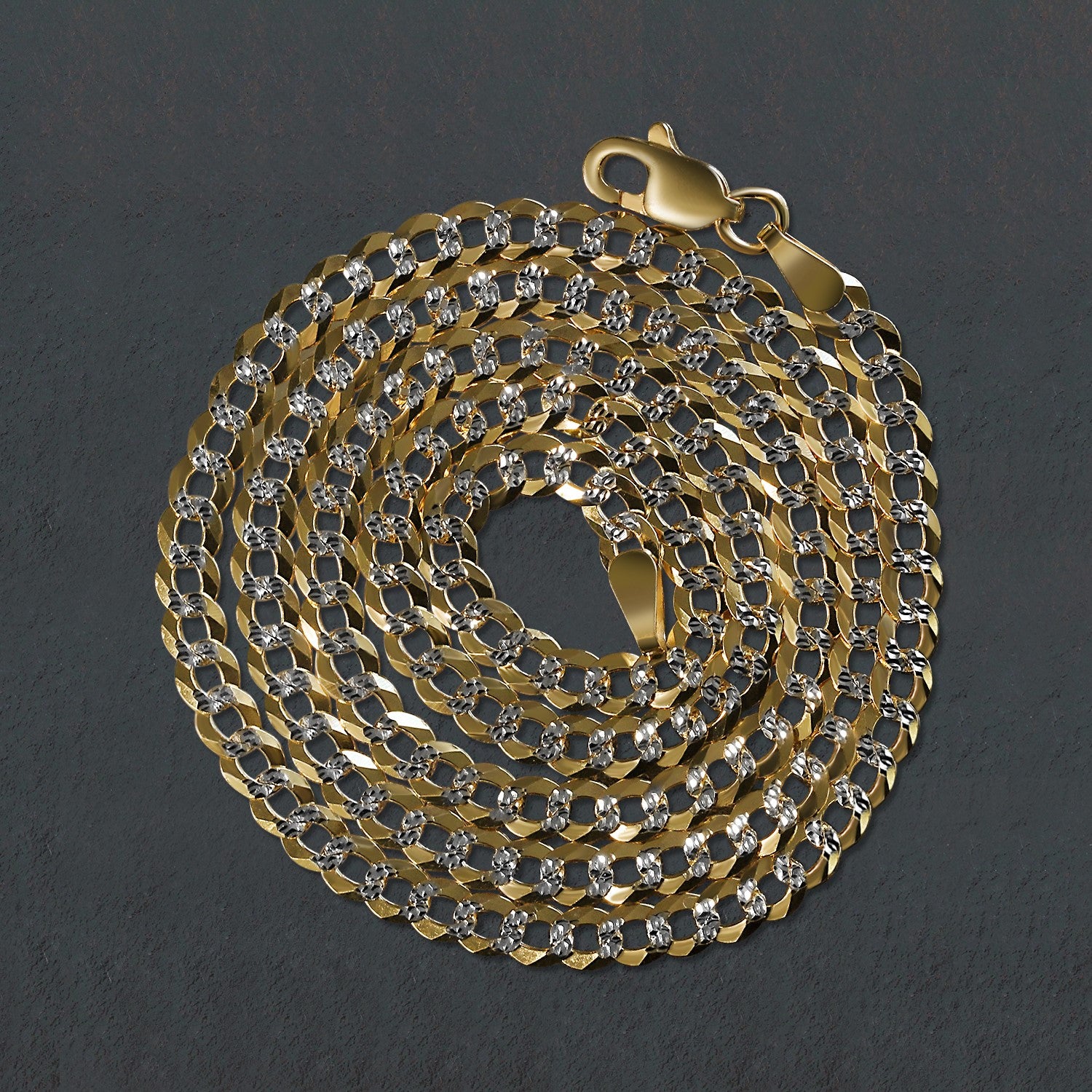 14k two-tone gold pave curb chain featuring a modern design, perfect for layering or standalone elegance.