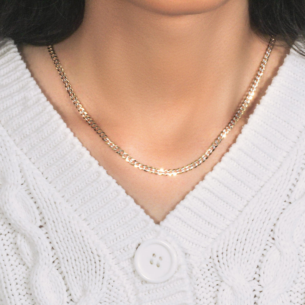 14k two-tone gold pave curb chain featuring a modern design, perfect for layering or standalone elegance.